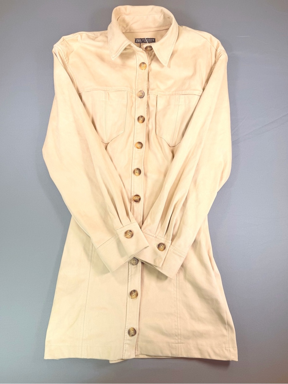 Zara beige faux suede button-down mini shirt dress with long sleeves.